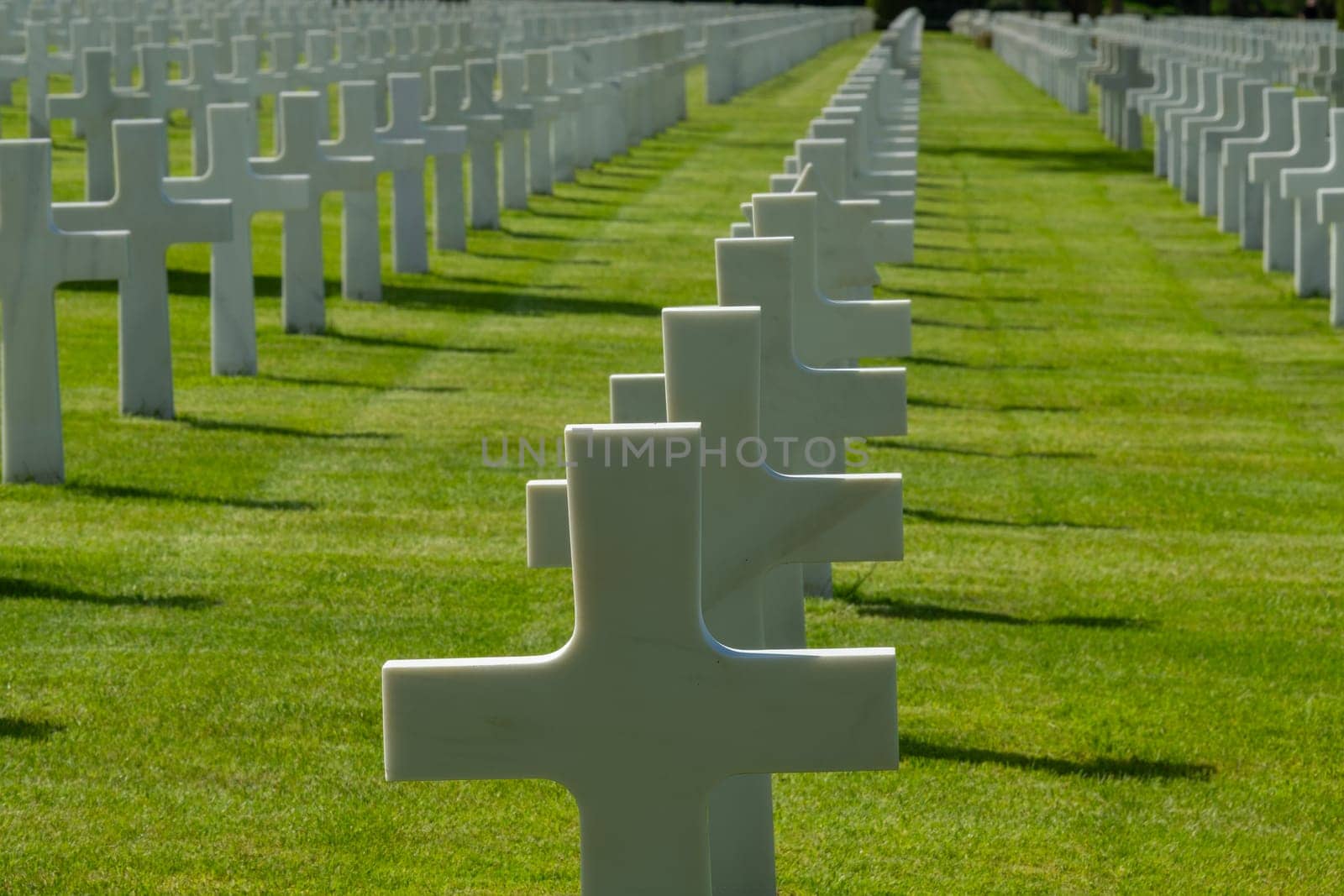 American cemetery at Normandy area. WWII memorial. Overhead view of lines of grave stones. High quality photo