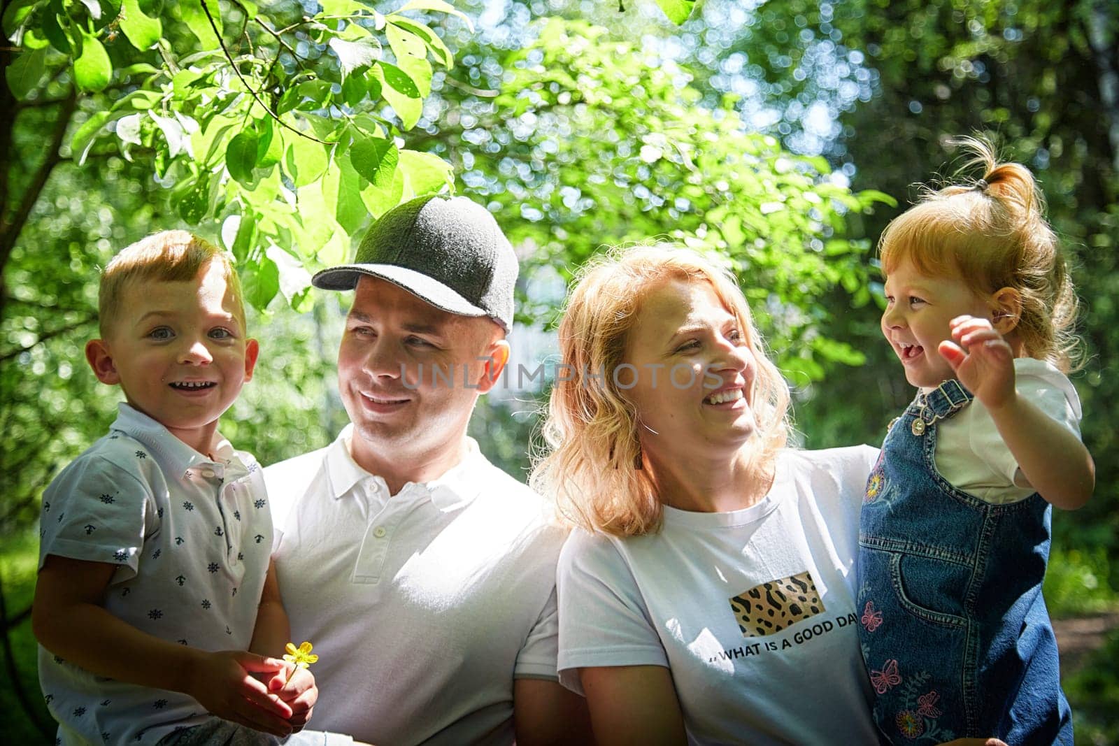 Family playing in the forest