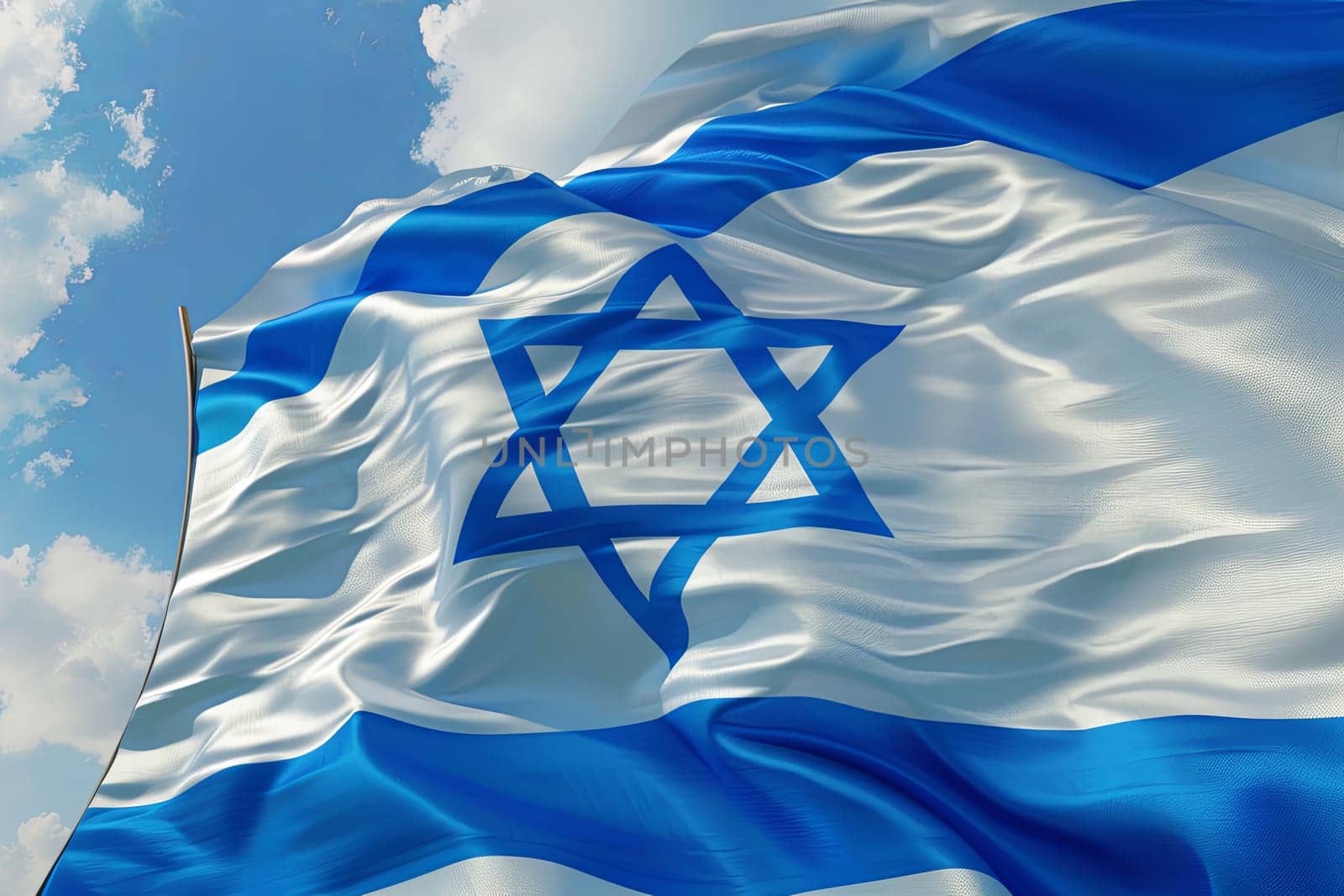 The national flag of Israel is waving in the wind, showcasing its white and blue colors and the Star of David.