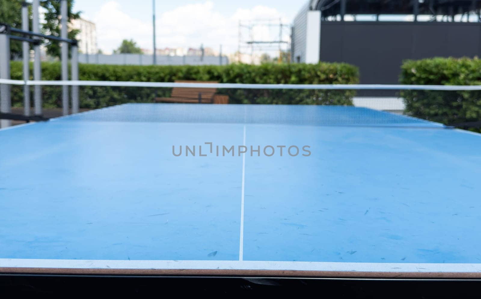 ping pong table in the garden. High quality photo