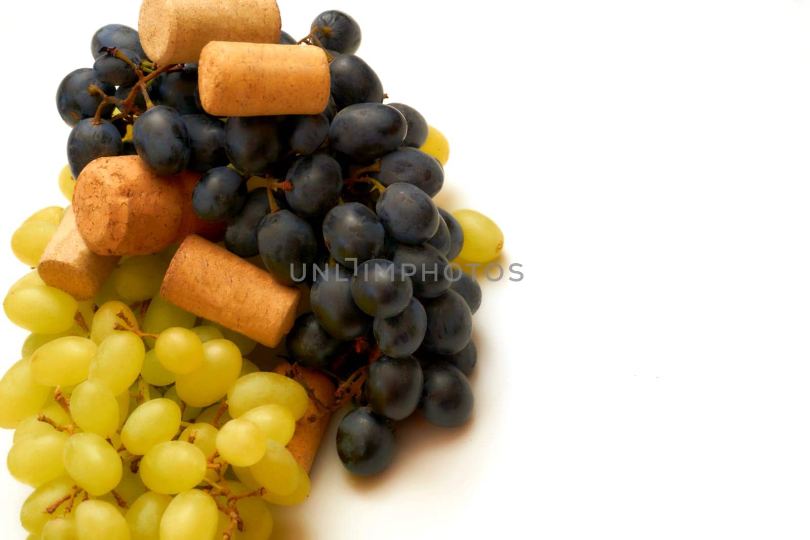 Wine stopper. Good old brandy, cognac,wine, black ripe grapes by jovani68