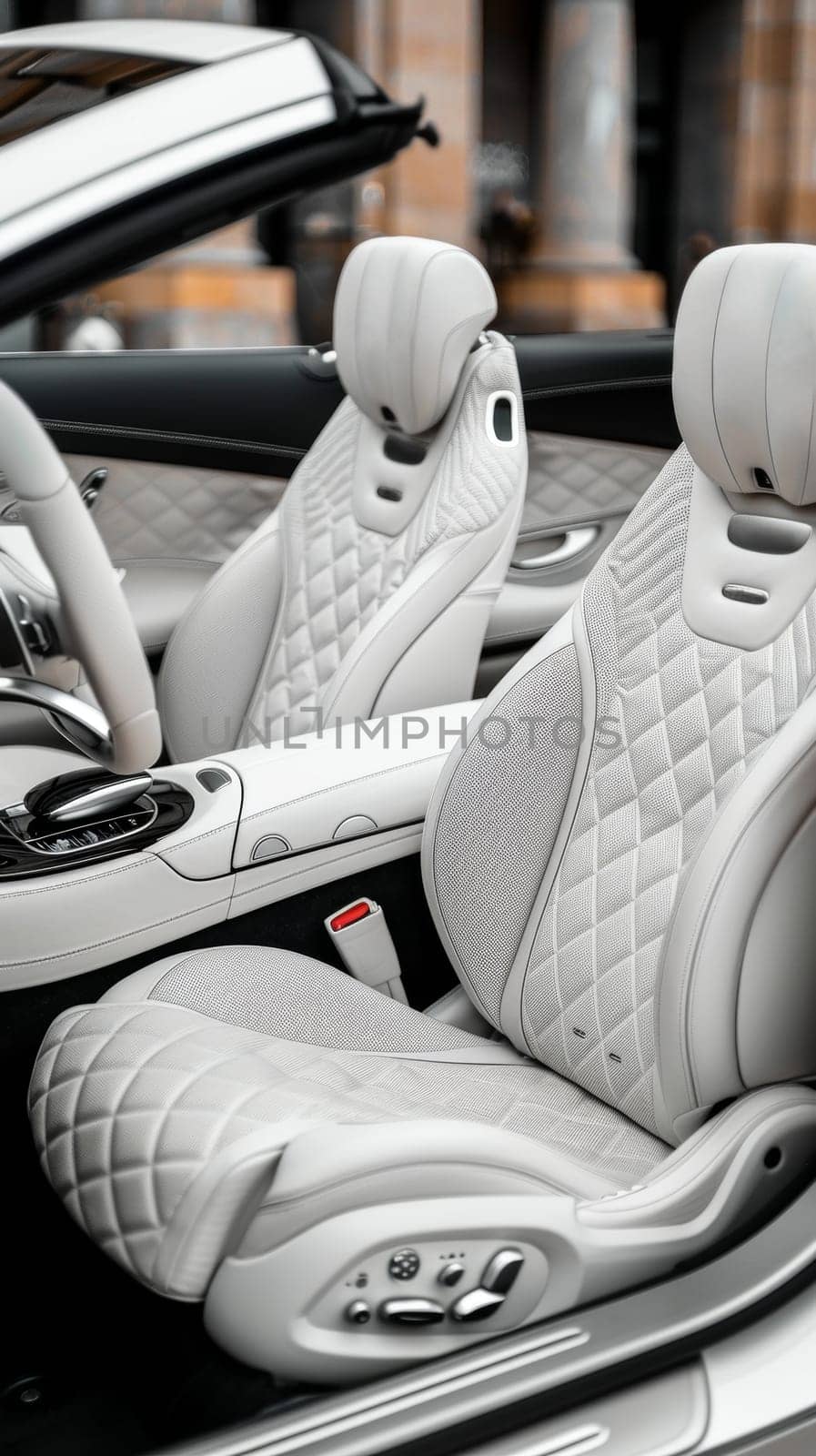 This image showcases the pristine interior of a luxury convertible, with white quilted seats and advanced controls. The open design invites an exhilarating driving experience. by sfinks