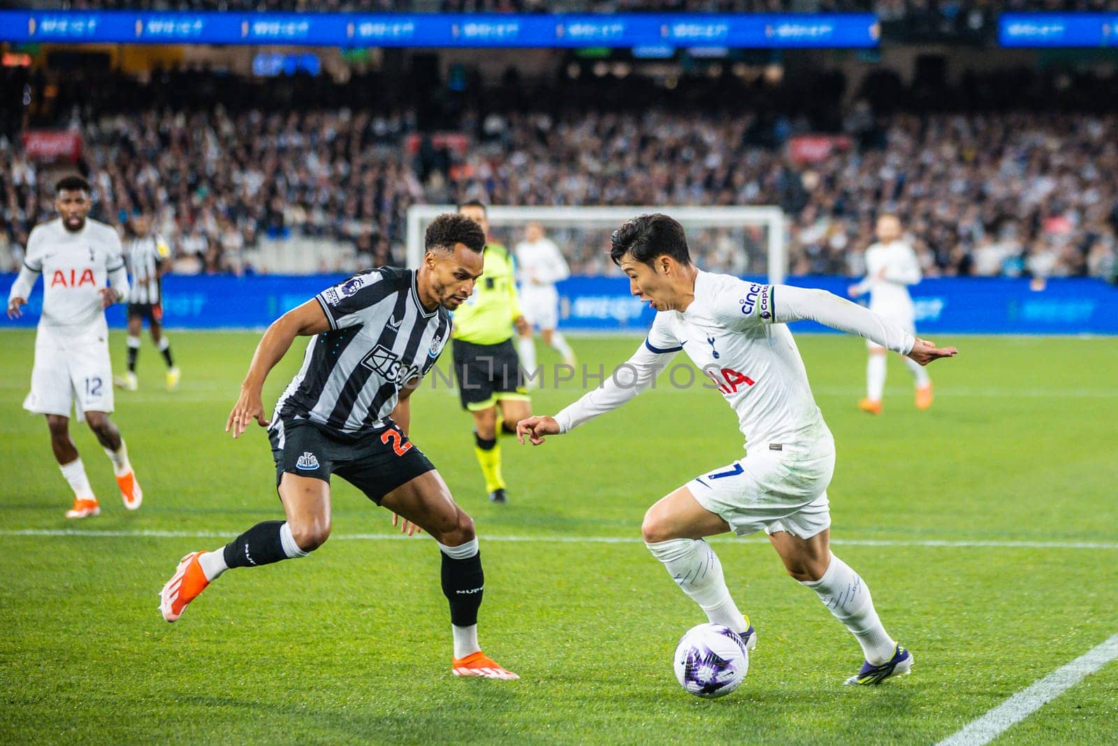 MELBOURNE, AUSTRALIA - MAY 22: Heung Min Son of Tottenham Hotspur takes on Jacob Murphy of Newcastle United during the Global Football Week at The Melbourne Cricket Ground on May 22, 2024 in Melbourne, Australia