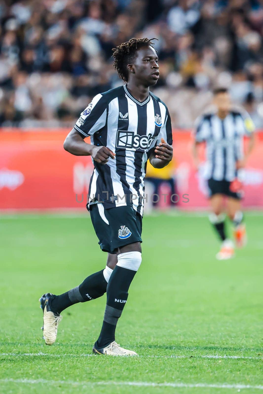 MELBOURNE, AUSTRALIA - MAY 22: Garang Kuol of Newcastle United on his debut whilst playing Tottenham Hotspur during the Global Football Week at The Melbourne Cricket Ground on May 22, 2024 in Melbourne, Australia