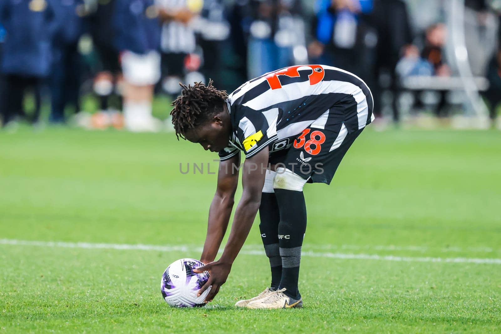 MELBOURNE, AUSTRALIA - MAY 22: Garang Kuol of Newcastle United taking a penalty whilst playing Tottenham Hotspur during the Global Football Week at The Melbourne Cricket Ground on May 22, 2024 in Melbourne, Australia