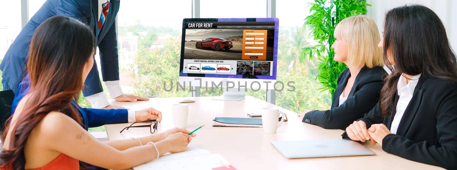 car rental website on computer screen for tourist to rent a car for snugly by biancoblue