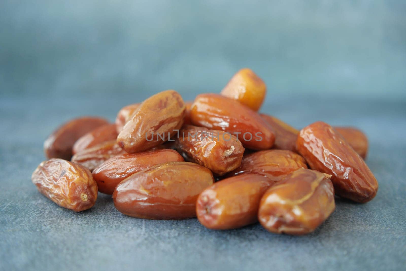 close up of fresh date fruit in a bowl