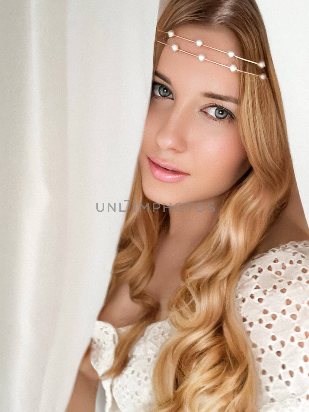 Beautiful bridal look, bride with long hair, wearing pearl tiara jewellery and beauty makeup, blonde woman with curly hairstyle, face portrait for wedding and fashion style by Anneleven
