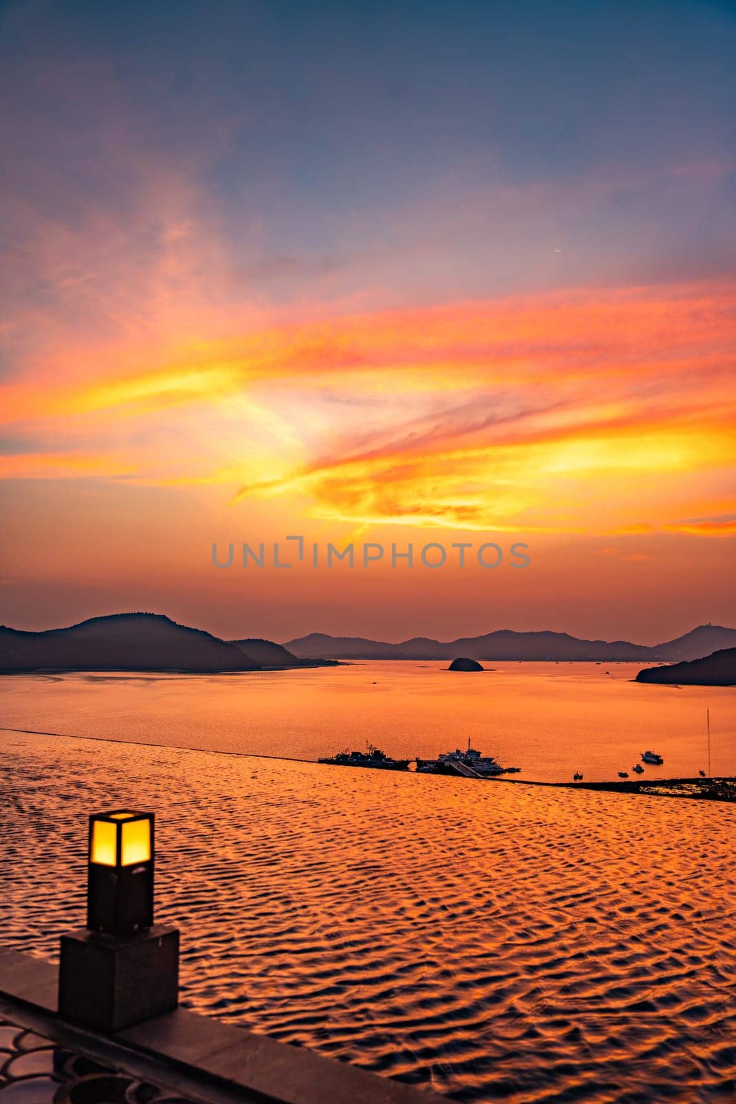 View of Cape Panwa beach at sunset, in Phuket, Thailand, south east Asia