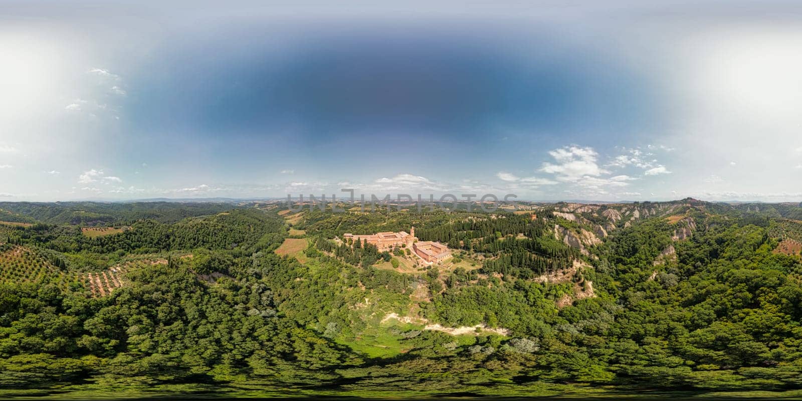 Aerial view of the Abbey of Monte Oliveto Maggiore, a large Benedictine monastery in the Italian region of Tuscany