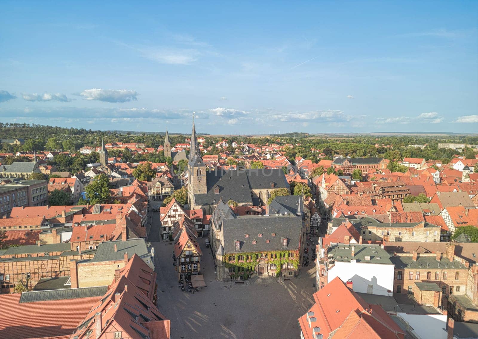 Aerial view of the Quedlinburg town hall, the city and the castle at sunset. Saxony-Anhalt, Germany