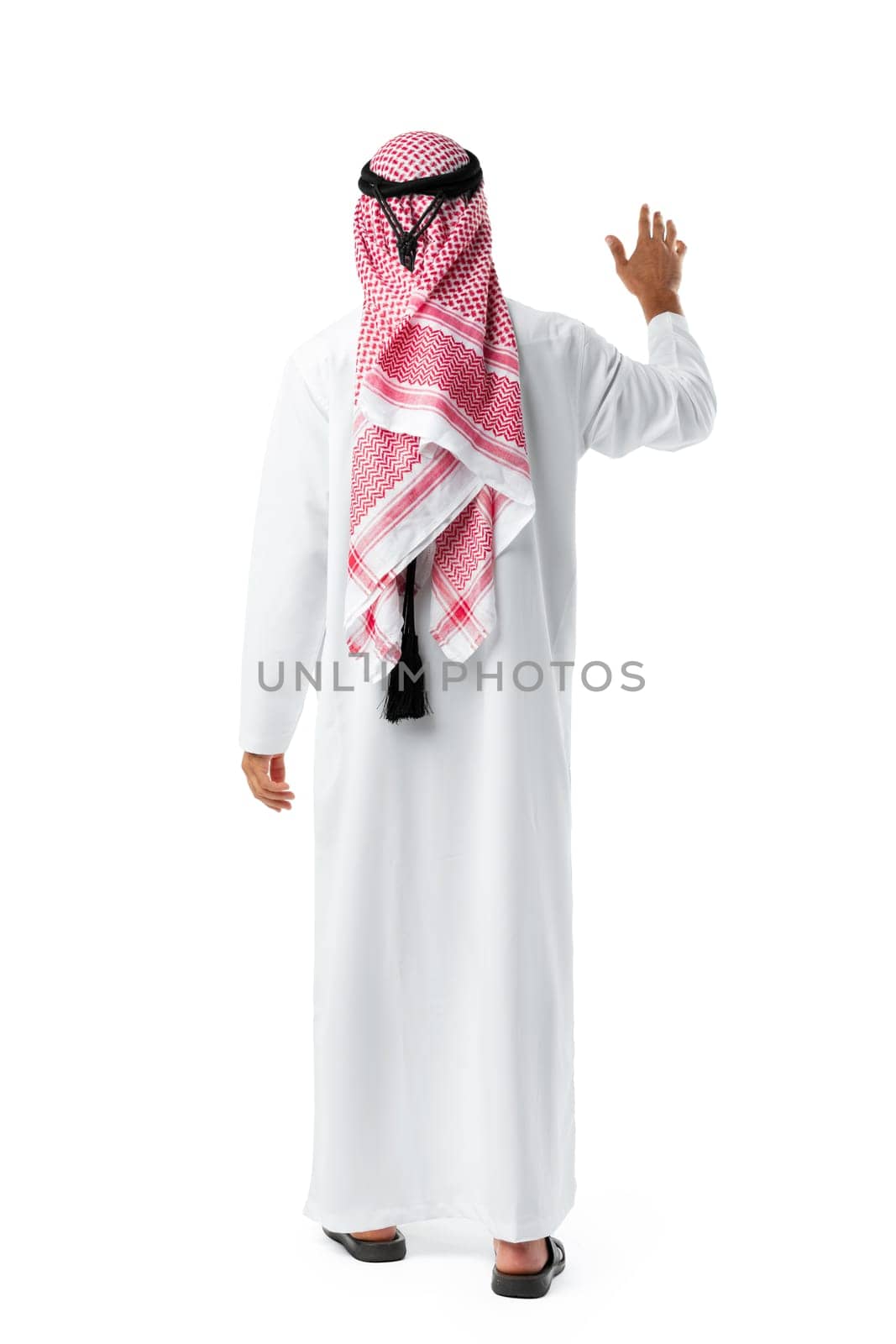 Back view of an Arab man standing on white isolated background close up