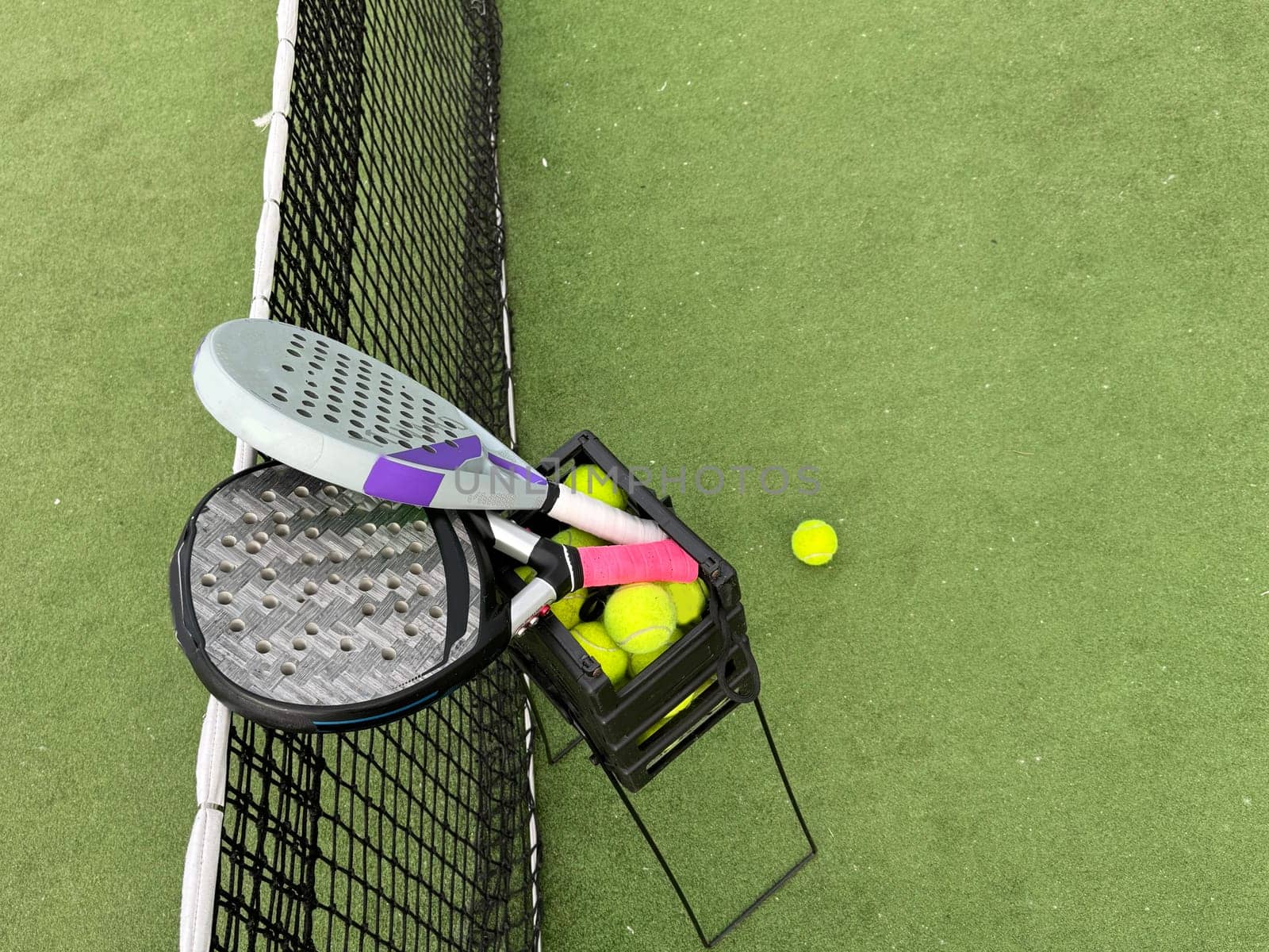 Paddle tennis racket and ball. High quality photo