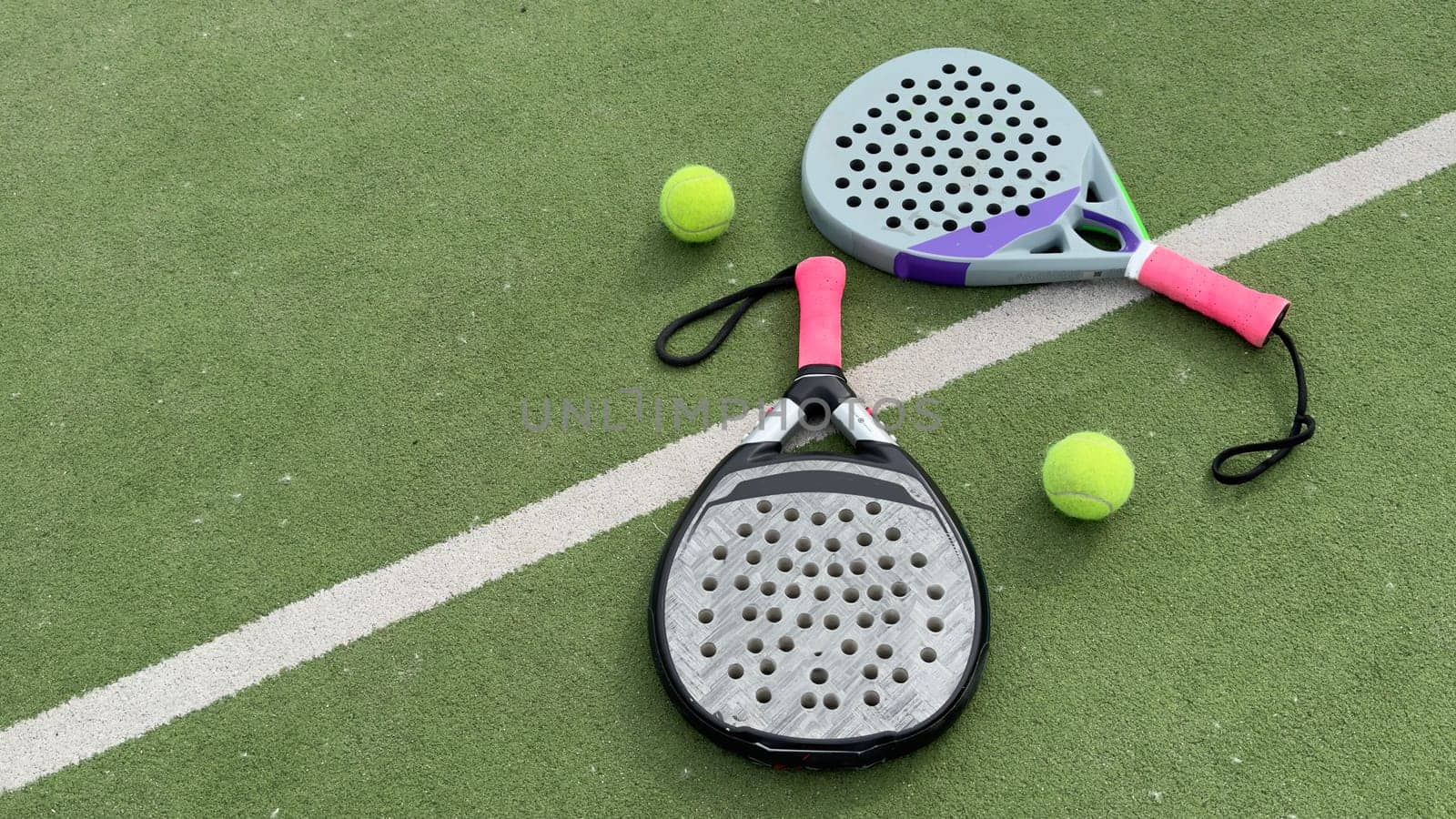 paddle rackets on the playing court. High quality photo