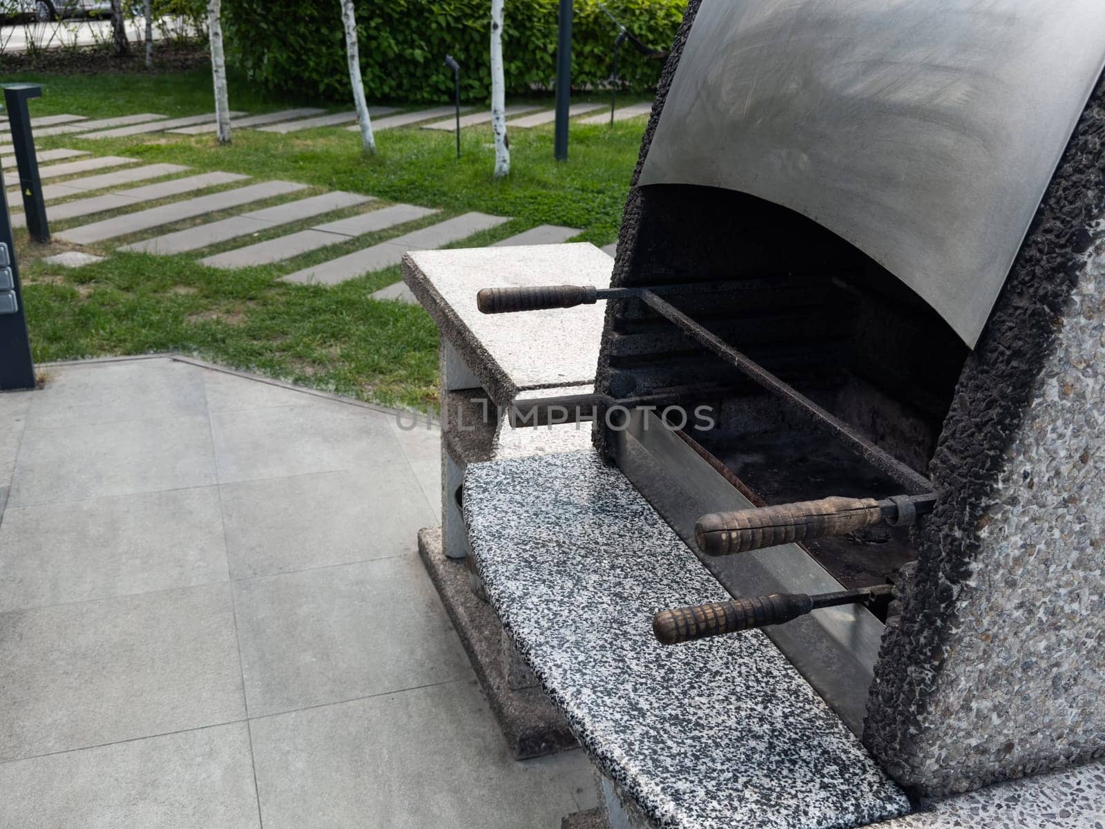 Outdoor BBQ grill. Barbecue open fireplace for cooking. High quality photo