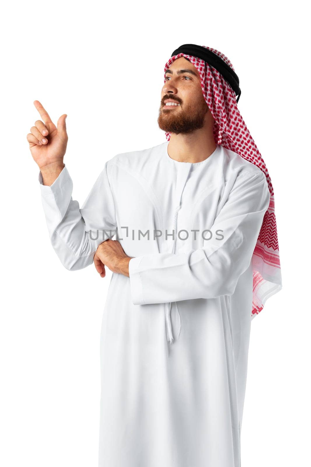 Young Arab man in traditional clothingpointing hand isolated on white background