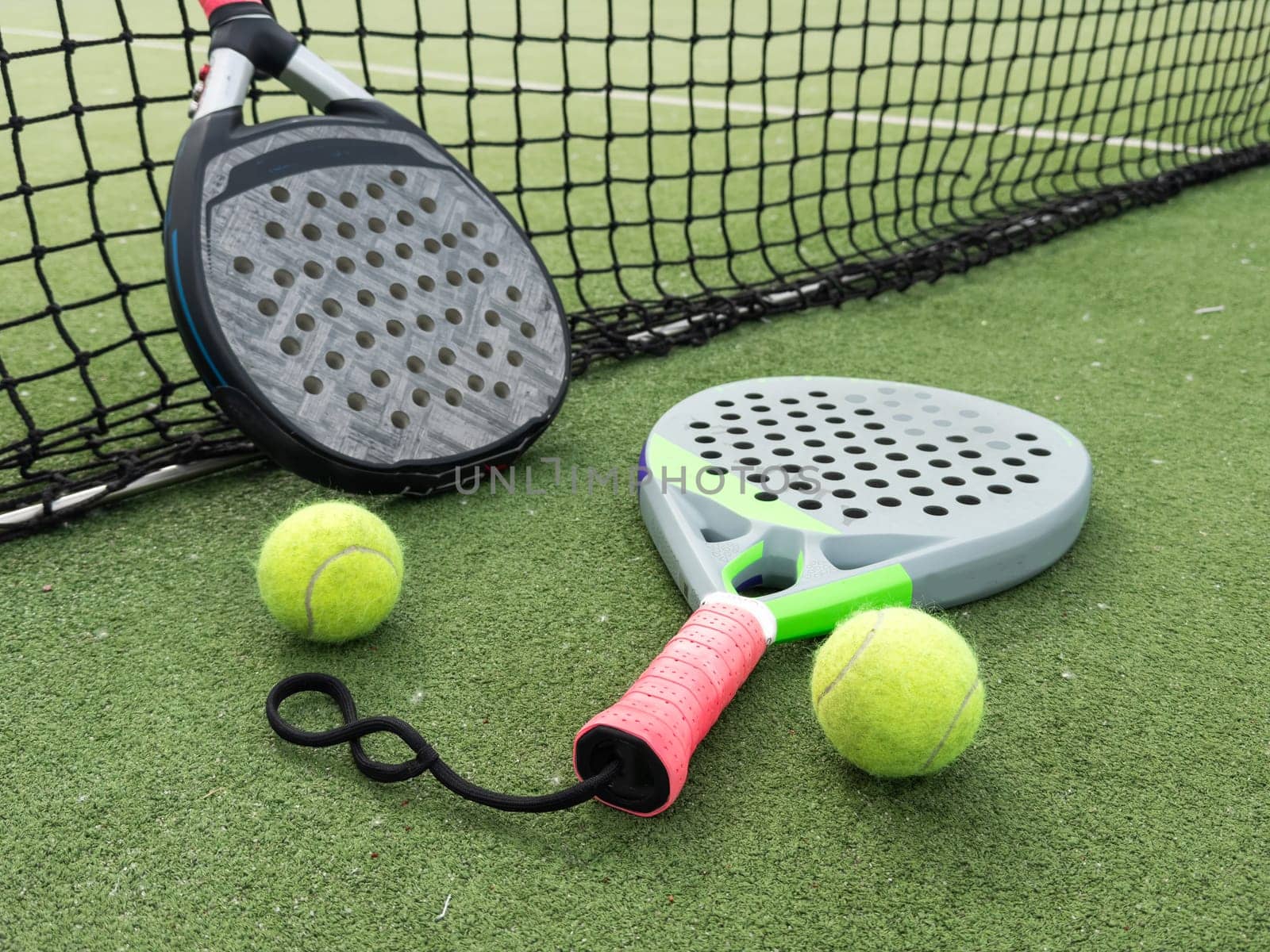 padel tennis racket sport court and balls. High quality photo