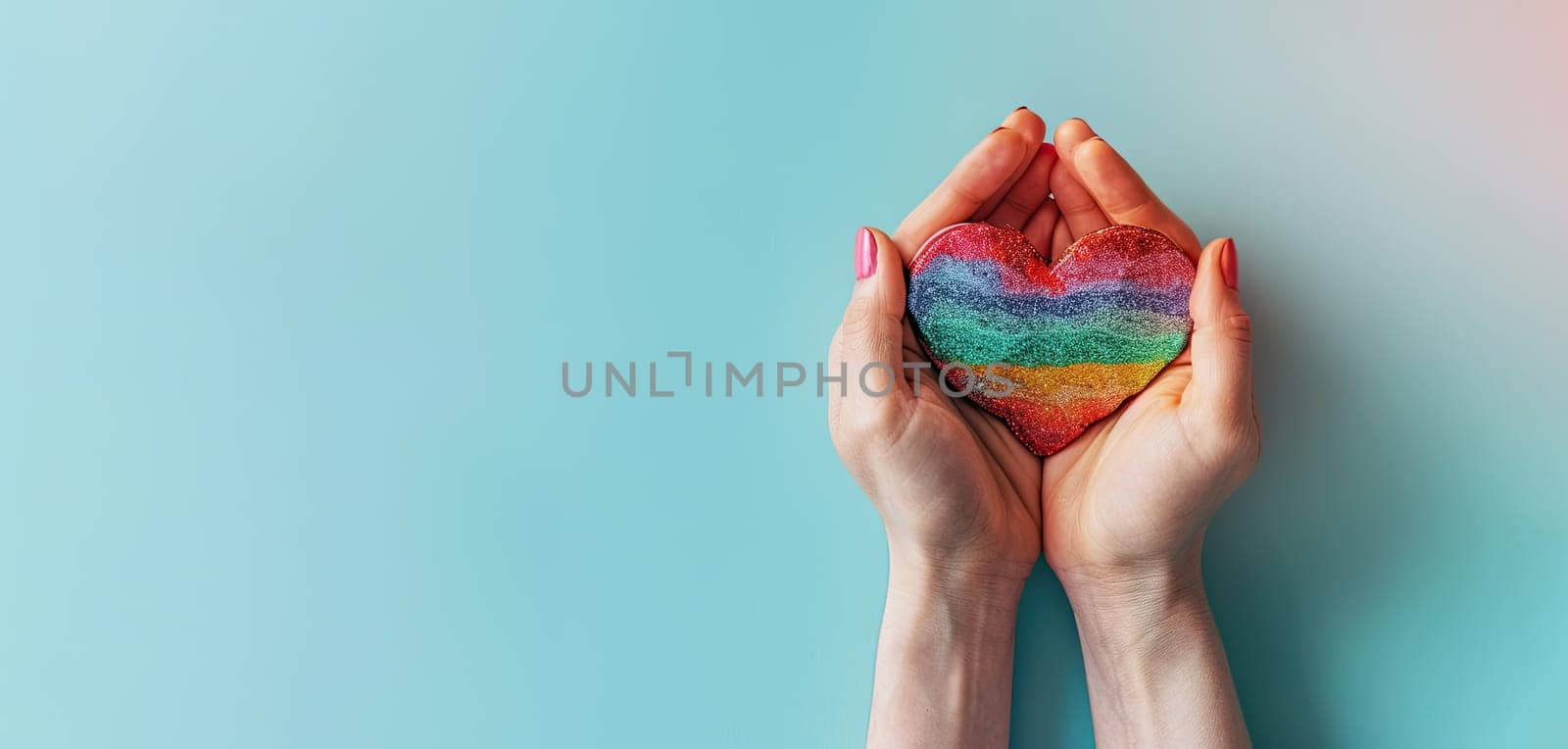 A person is holding a rainbow heart in their hand by AI generated image.
