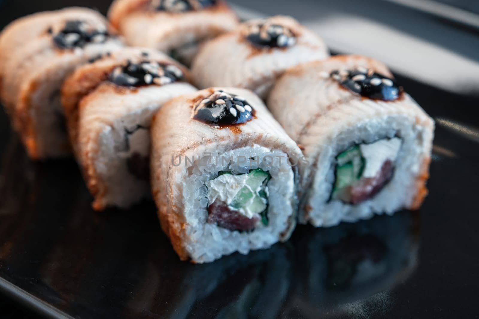 Sushi Rolls California with shrimp eel sesame. Food delivery. 4K Close-up