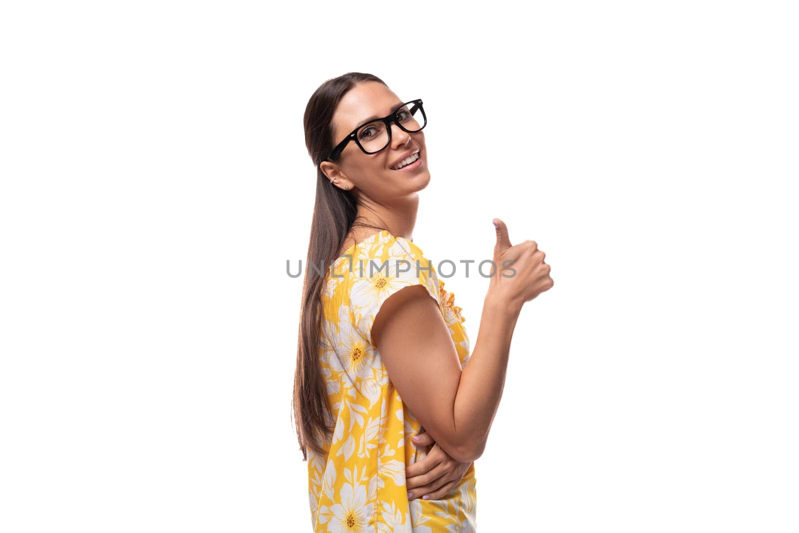 young european woman with vision glasses dressed in summer outfit shows super hand.