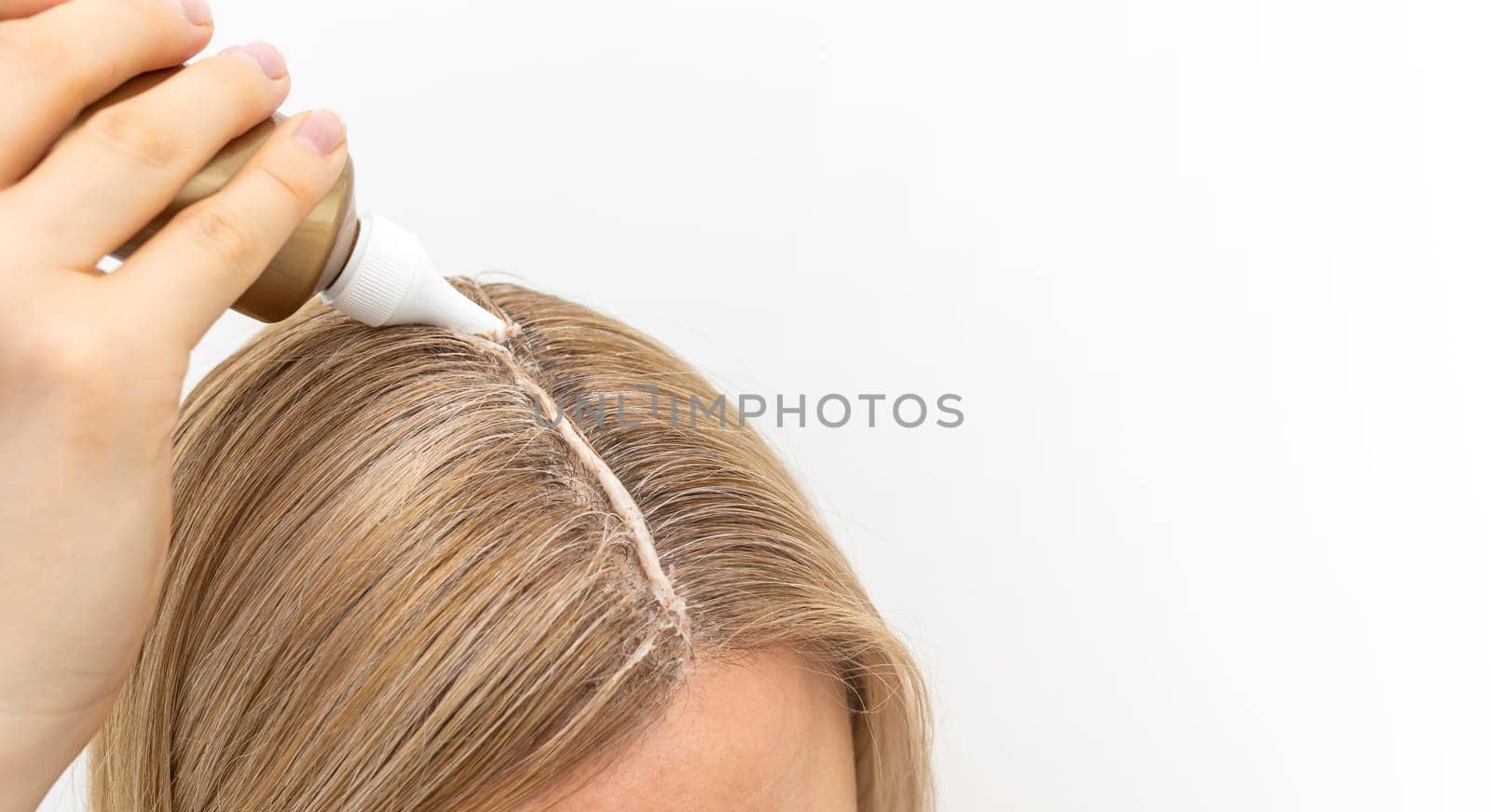 Design Middle Age Woman Applies Scalp Peeling, Scrub on Head Skin, Hair. Dandruff. Caucasian Female Holds Tube with Purifying and Soothing Cosmetics Product. Horizontal Copy Space For Text. Template.
