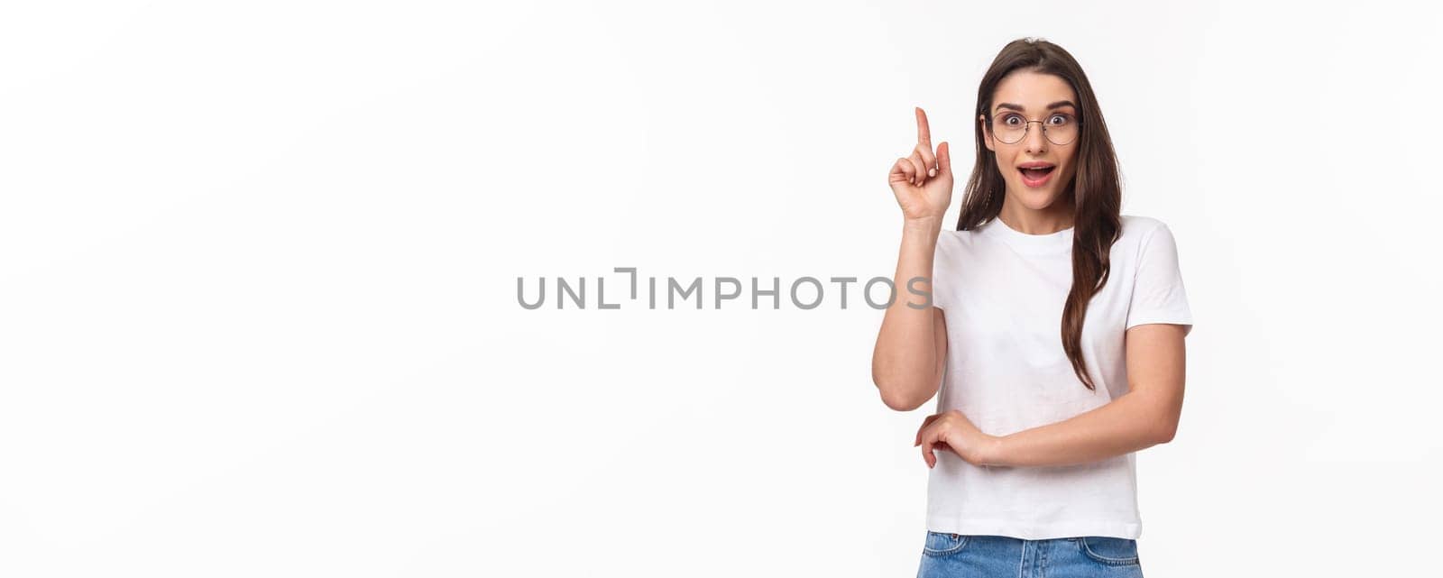 Waist-up portrait of excited, creative and smart talented pretty woman in glasses suggesting great idea, raise finger up eureka gesture, smiling enthusiastic, propose plan, think-up solution by Benzoix