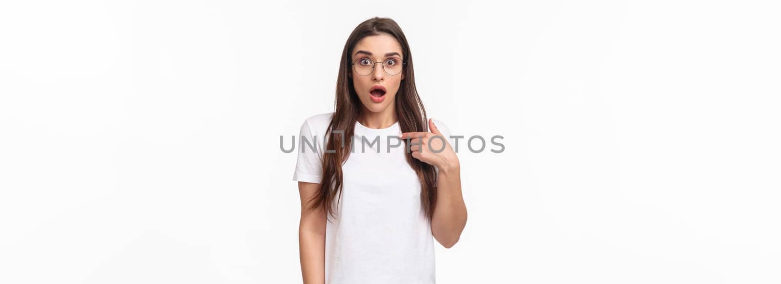 Portrait of surprised, startled young brunette female 20s in glasses, pointing at herself gasping and open mouth, widen eyes staring camera, being mentioned or chosen, picked from crowd by Benzoix