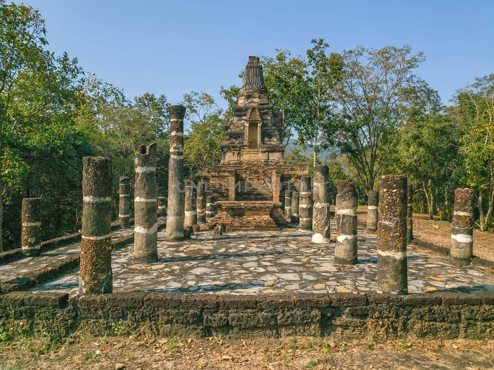Wat Phra Bat Noi historical temple by day in Sukhothai, Thailand