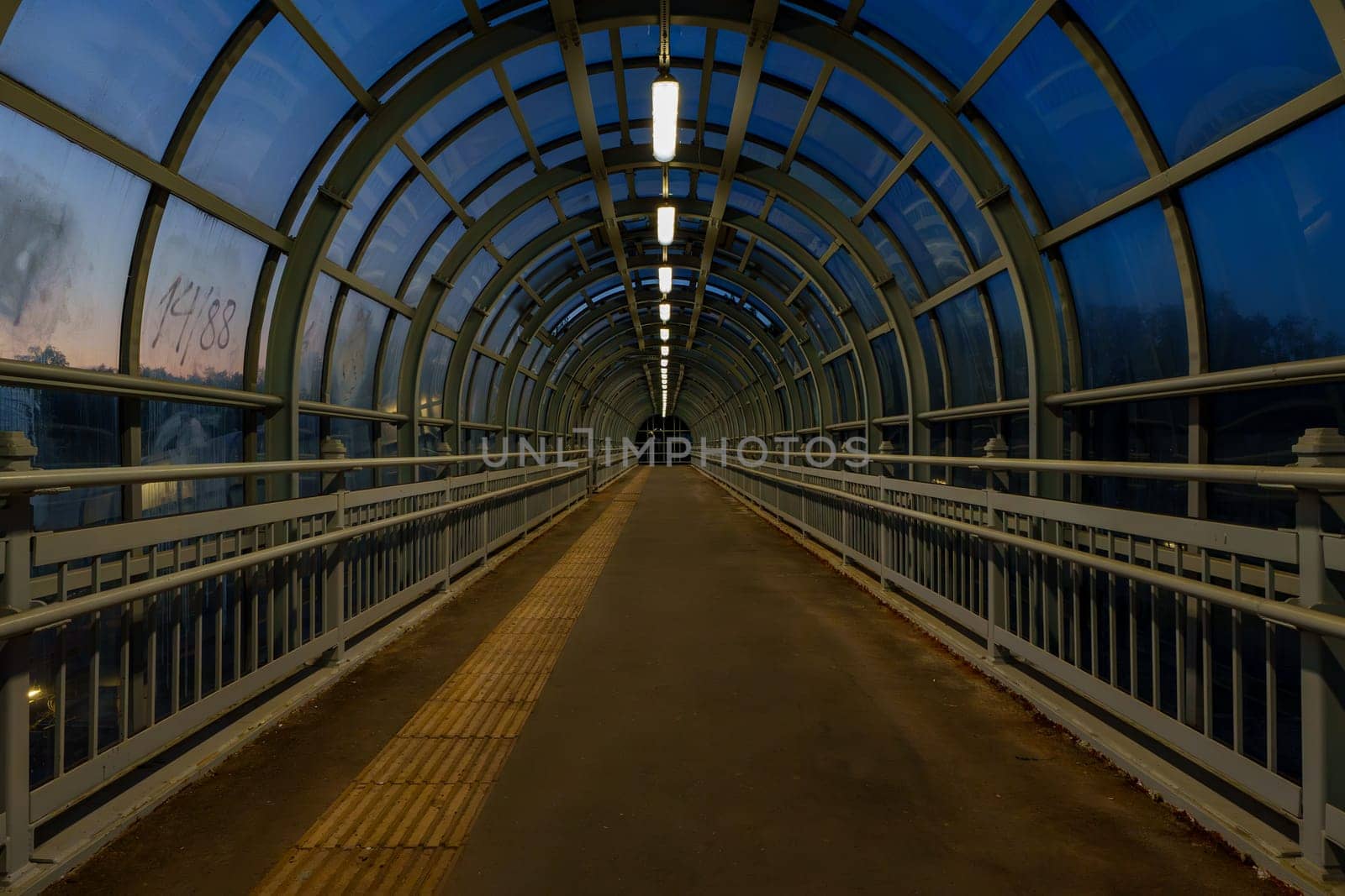 A pedestrian crossing at sunset. Tunnel Shot using a wide angle lens