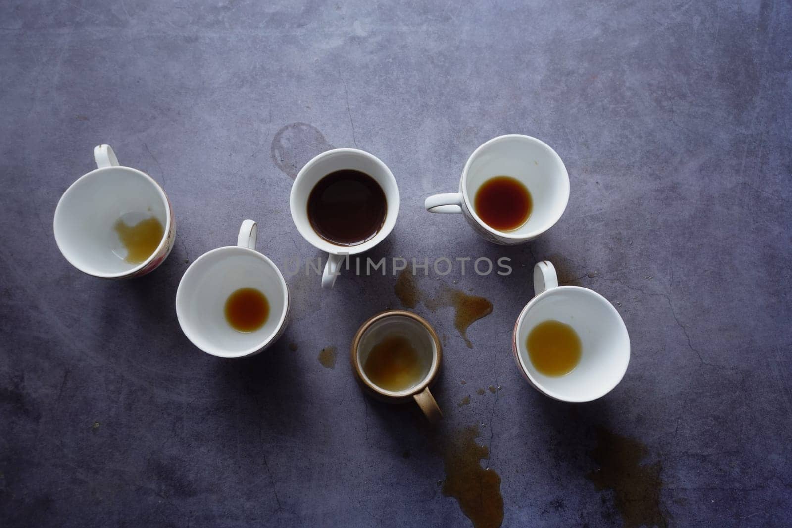 top view of coffee spilled on a black background .