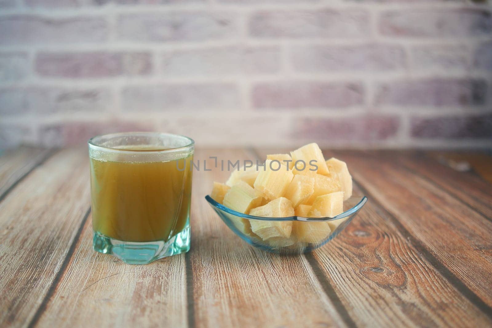 Sugarcane juice on a table .