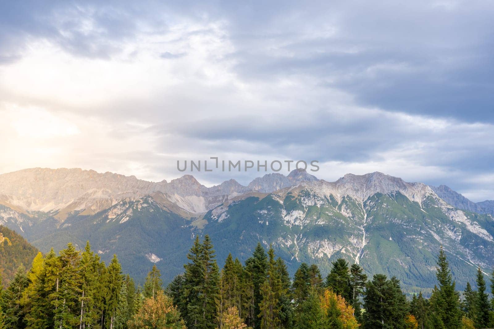 Wallpaper of a mountain landscape at sunset. High quality photo
