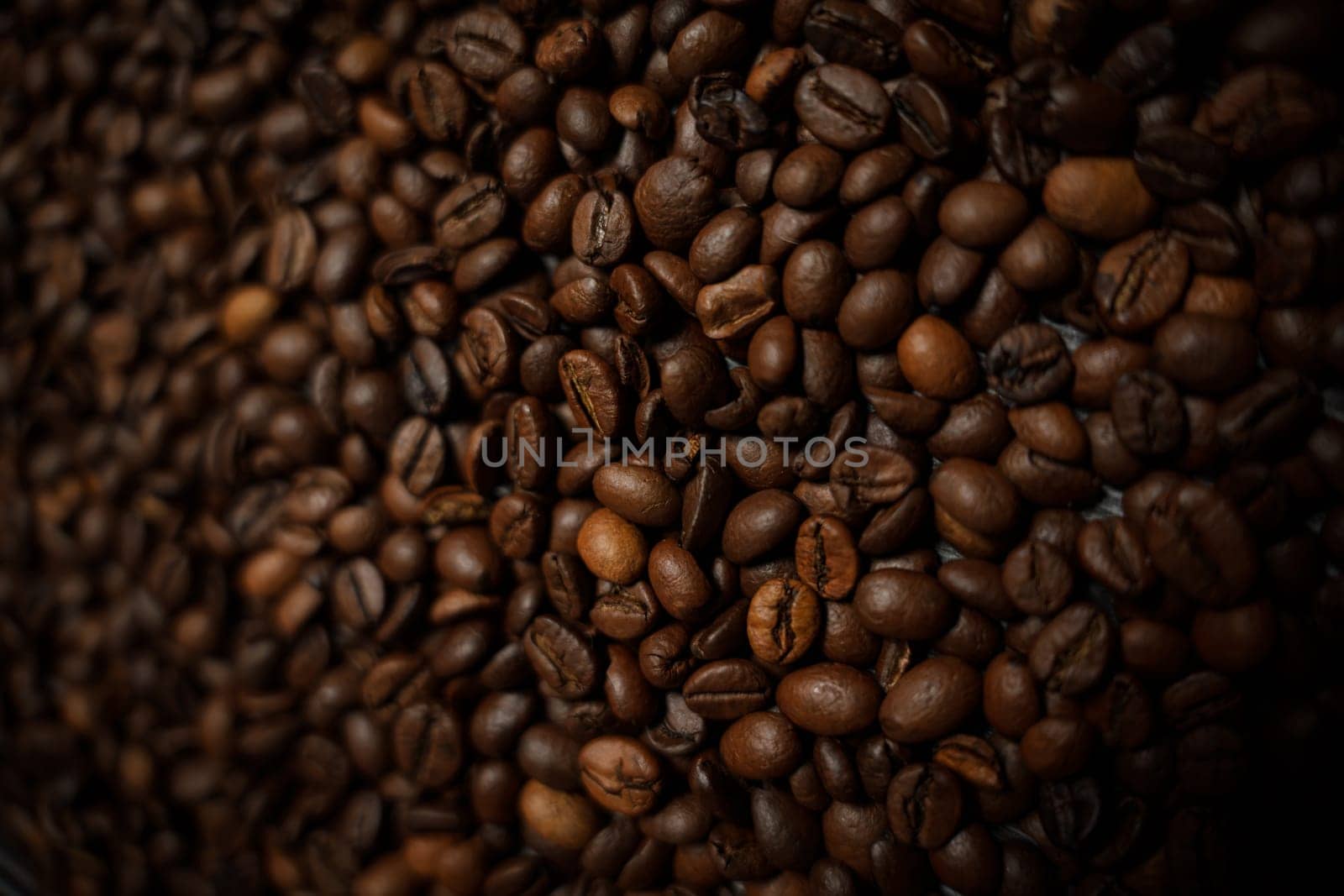 Colorful background with coffee beans in close-up. High quality photo