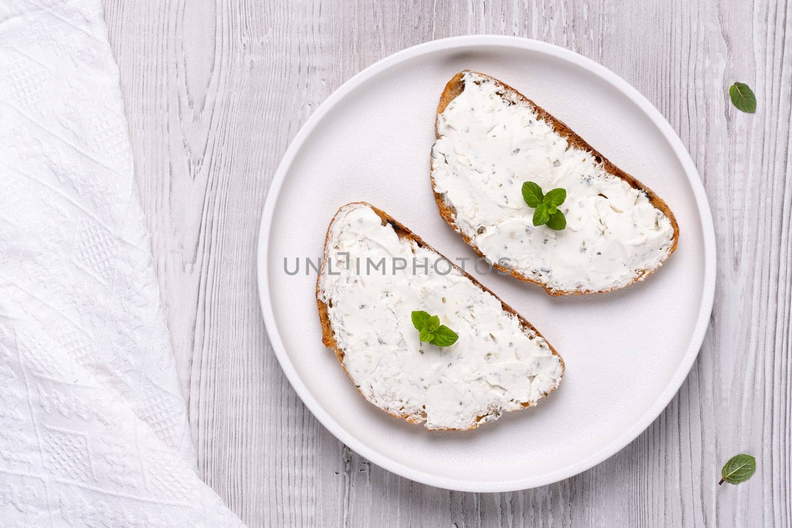 Cottage cheese sandwiches decorated with mint.