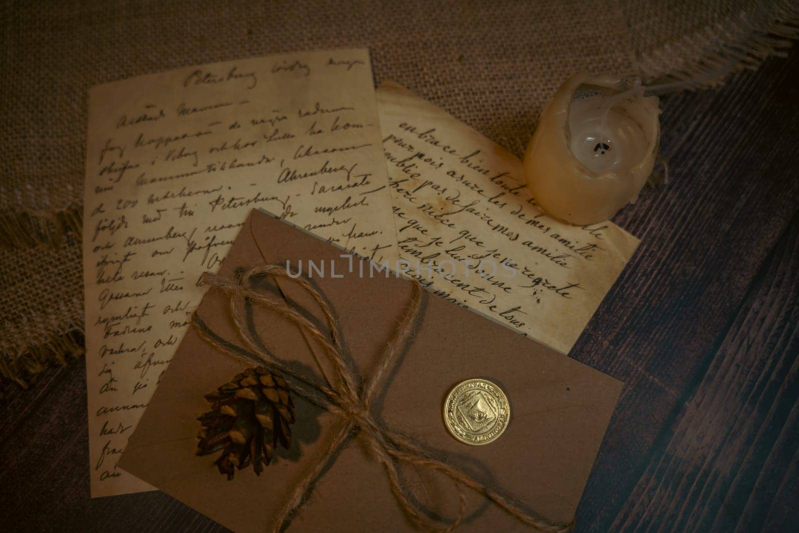 An antique envelope and a letter on the table. High quality photo