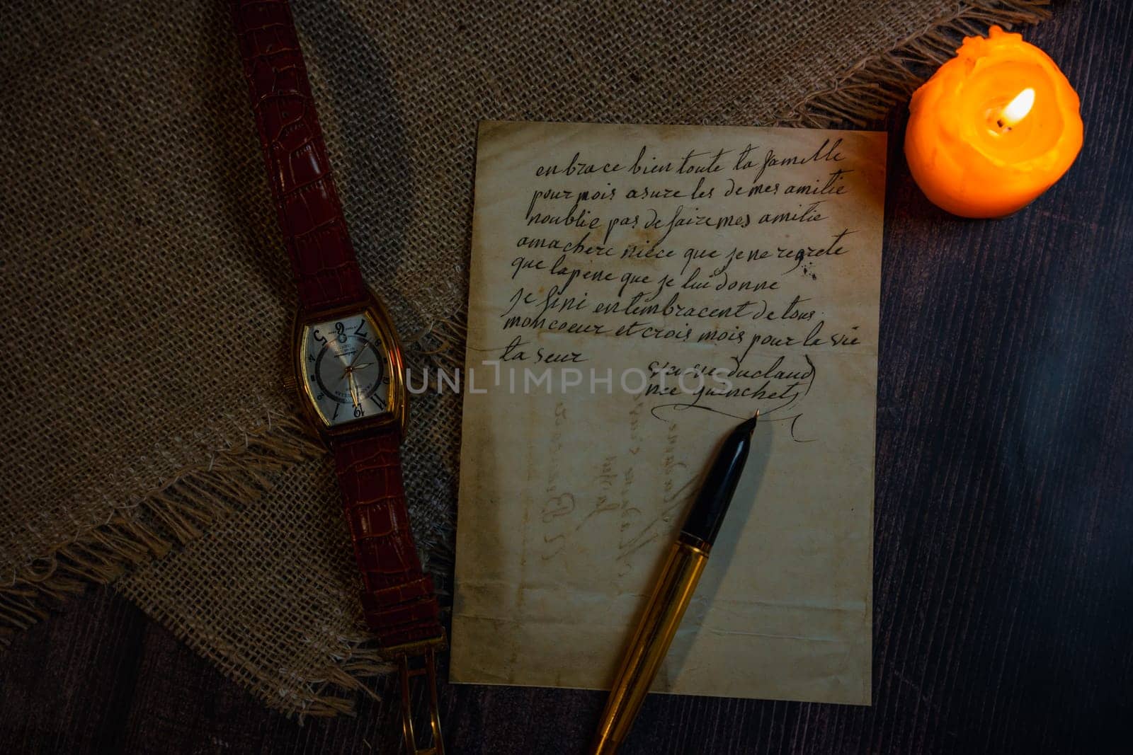 An antique envelope and a letter on the table. High quality photo