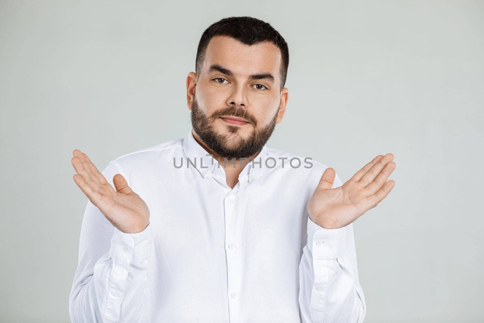 I do not know what to do. man showing helpless gesture with hands