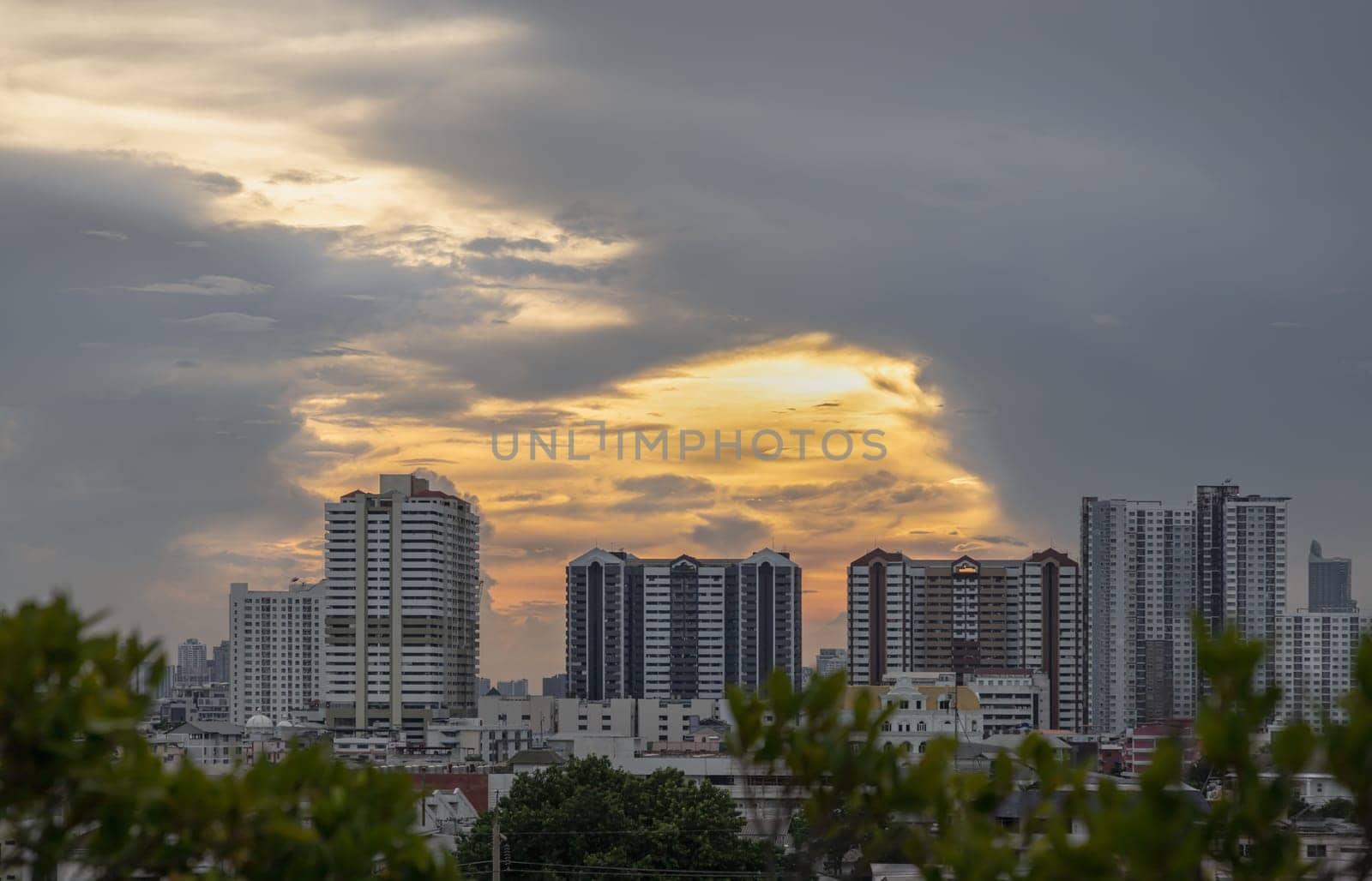 Bangkok, Thailand - May 20, 2024 - Gorgeous scenic of sunset with beautiful cloud and sky over metropolitan city. Bangkok city skyscrapers after sunset with Beautiful sky background, They can be used as Wallpaper, Copy space, Selective Focus.