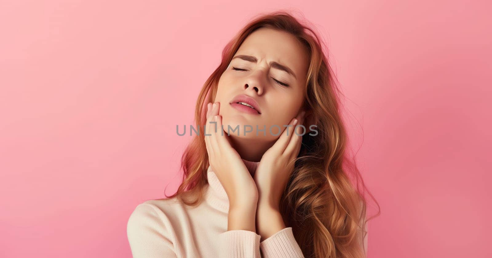 Portrait of unhappy young woman suffers from toothache, pain in teeth, dental hygiene or oral health, patient frowning touches his cheek on pink background