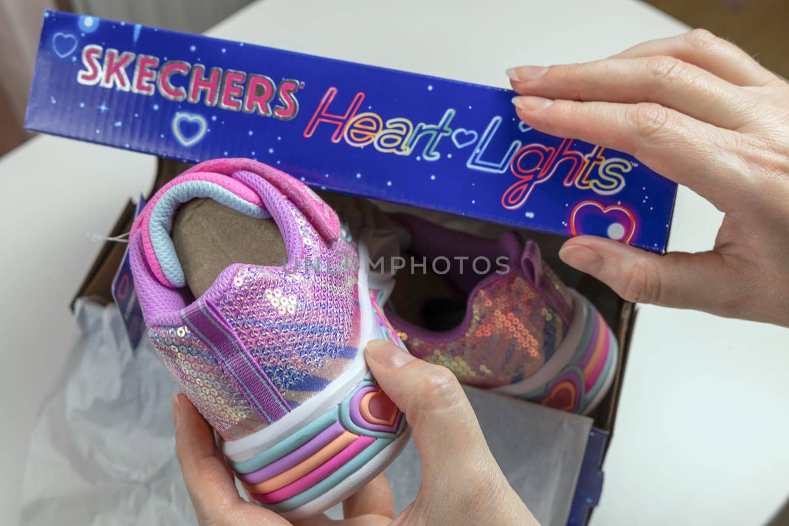 Children's sports shoes. New fashion Skechers sneakers for children in box. Denmark - November 13, 2023
