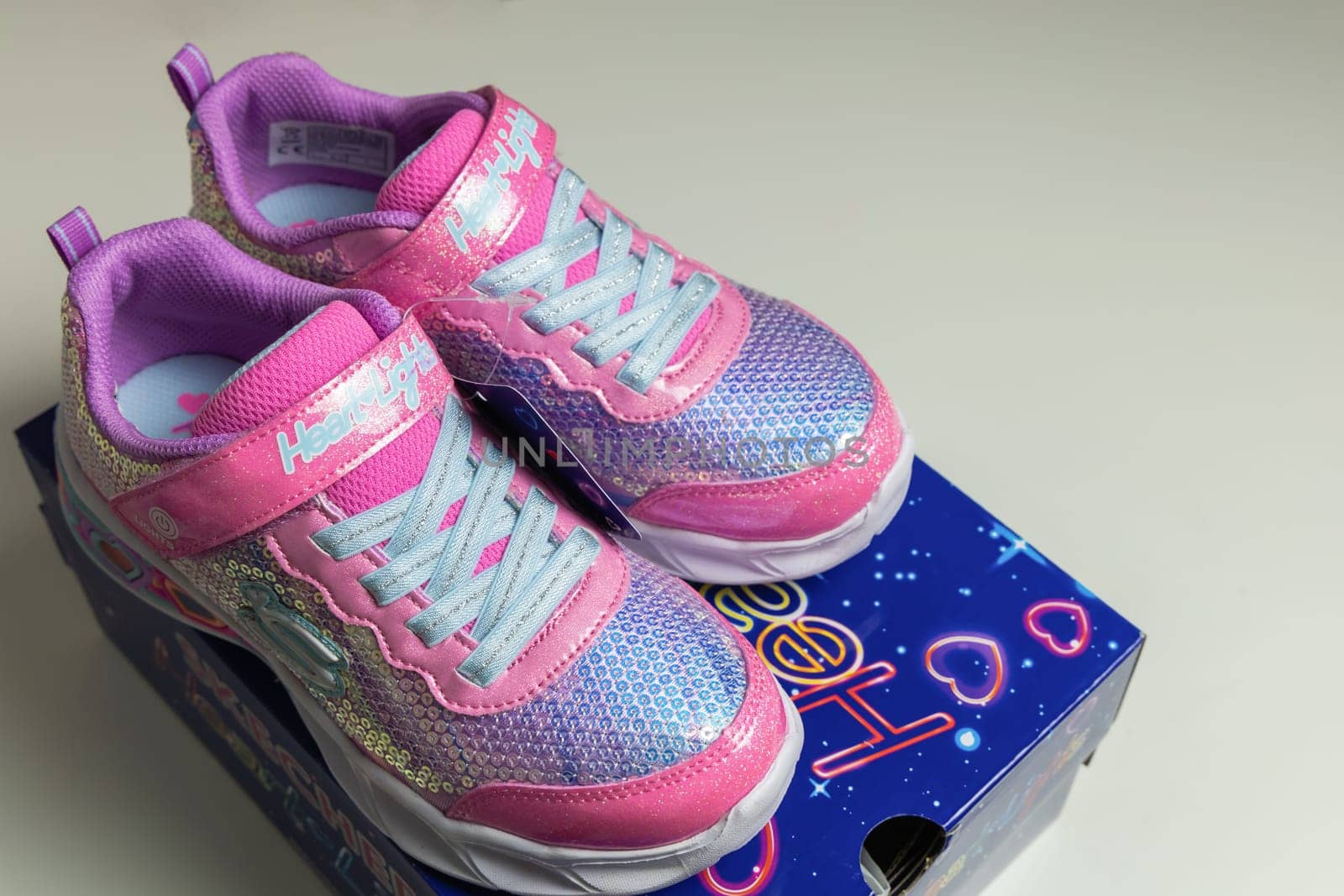 Children's sports shoes. New fashion Skechers sneakers for children in box. Denmark - November 13, 2023