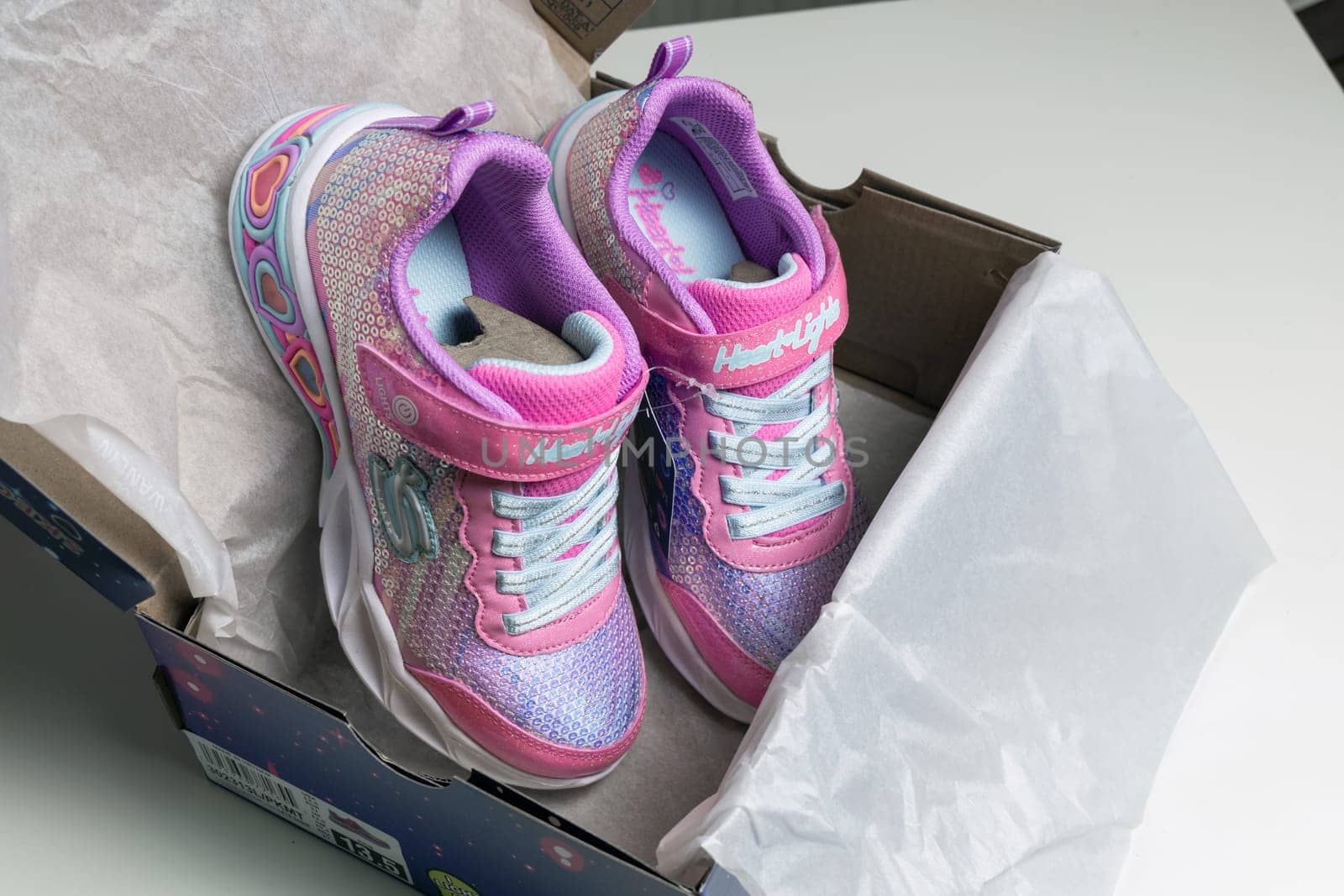 Children's sports shoes. New fashion Skechers sneakers for children in box. Denmark - November 13, 2023