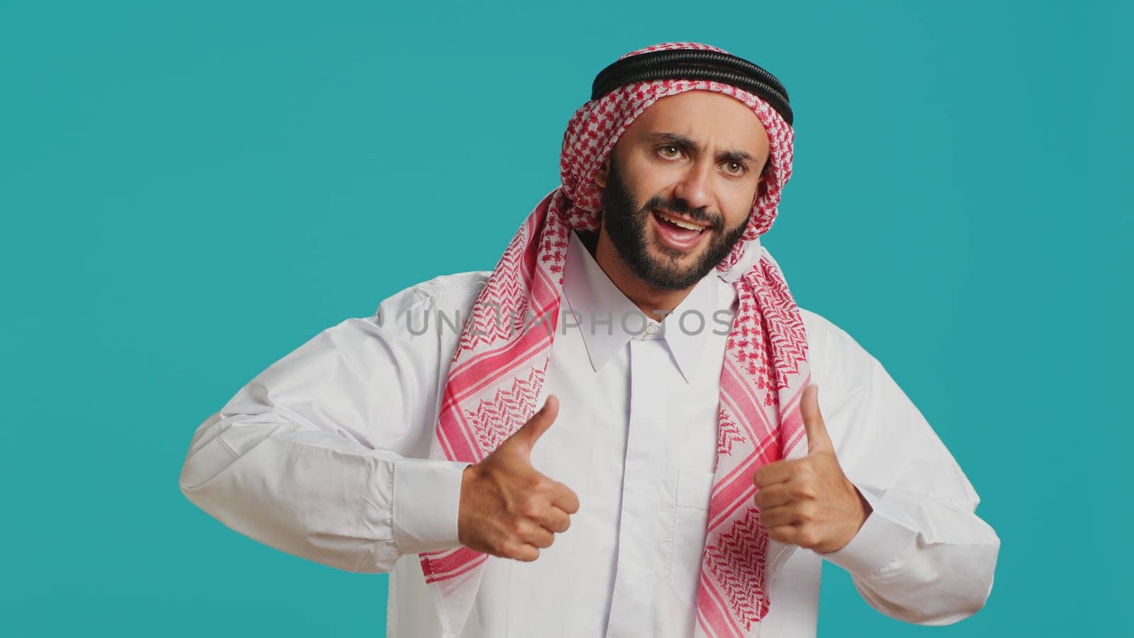 Middle eastern guy gives thumbs up by DCStudio
