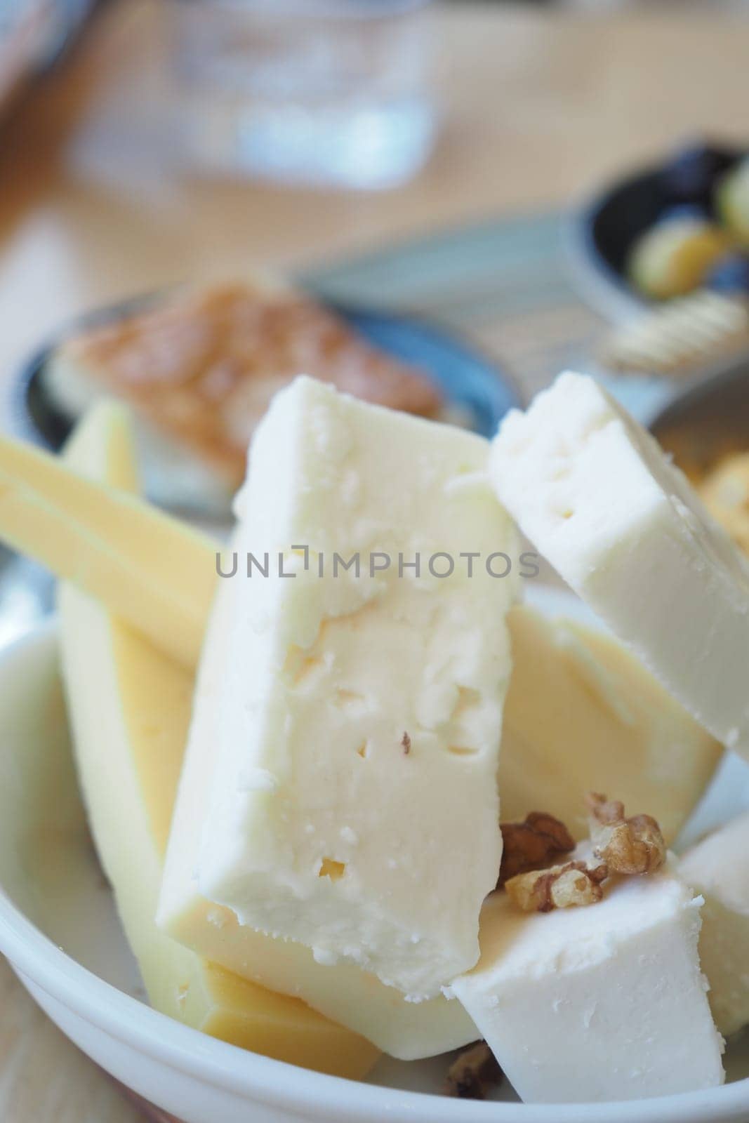 Cheese platter with different kinds of cheese.