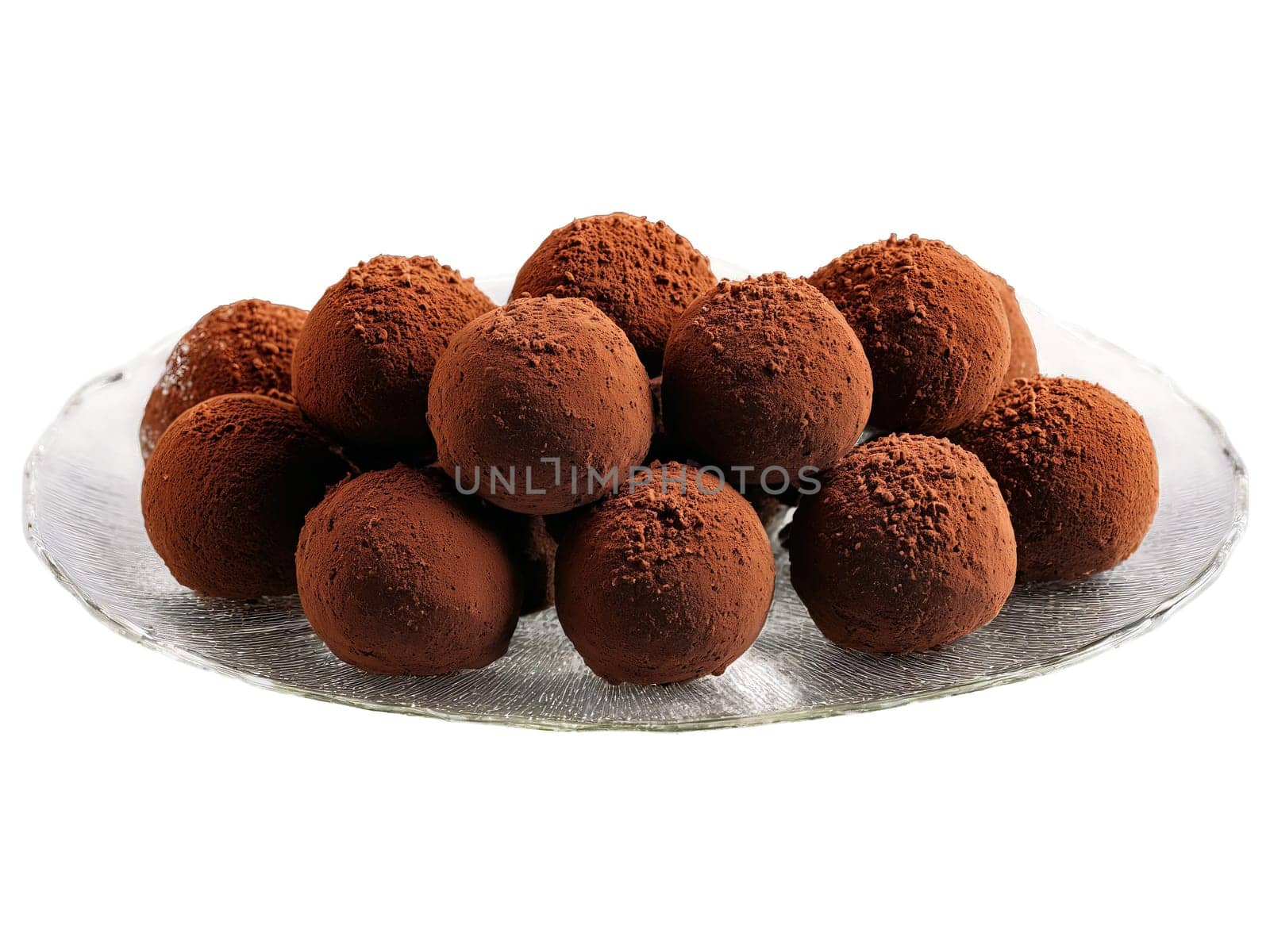Chocolate luxury truffles dusted with cocoa powder arranged on a transparent glass dish elegant. Food isolated on transparent background.