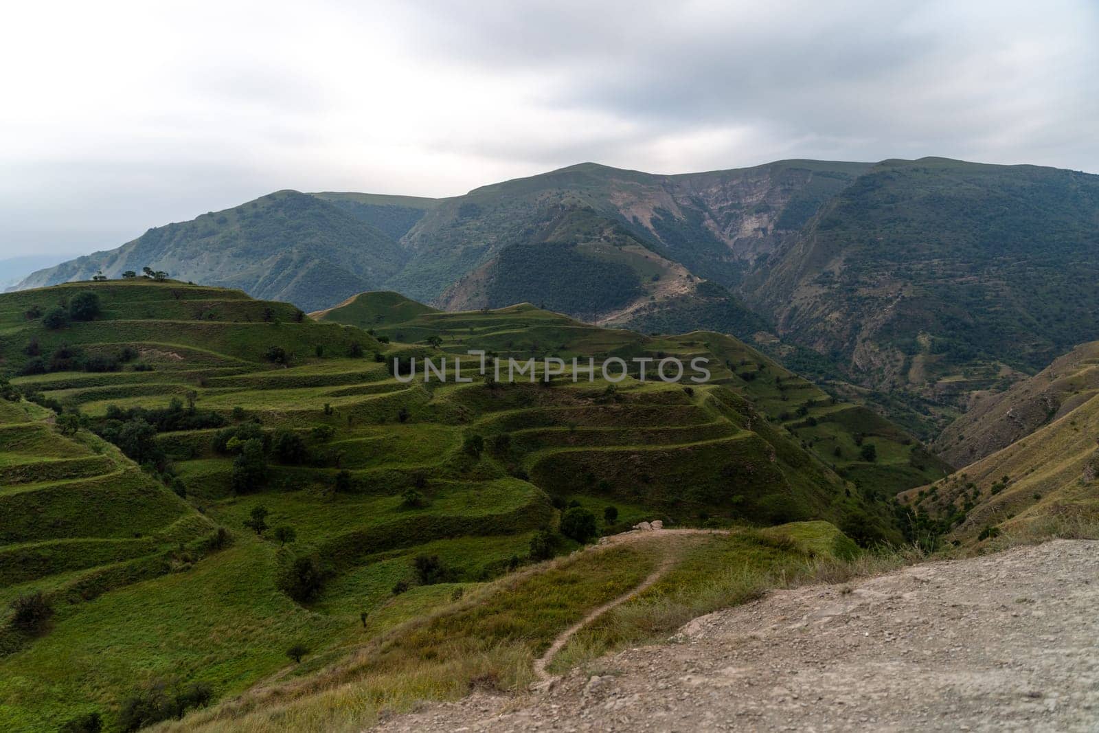 Chokhsky terraces Dagestan. Landscape of mountainous Dagestan with terraced fields and peaks mountains in the distance