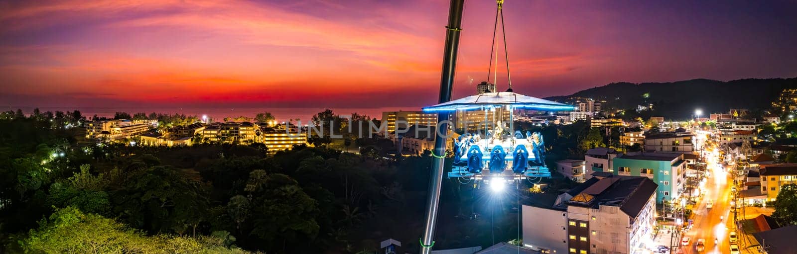 Aerial view of a dinner in the sky in Karon, Phuket, Thailand by worldpitou