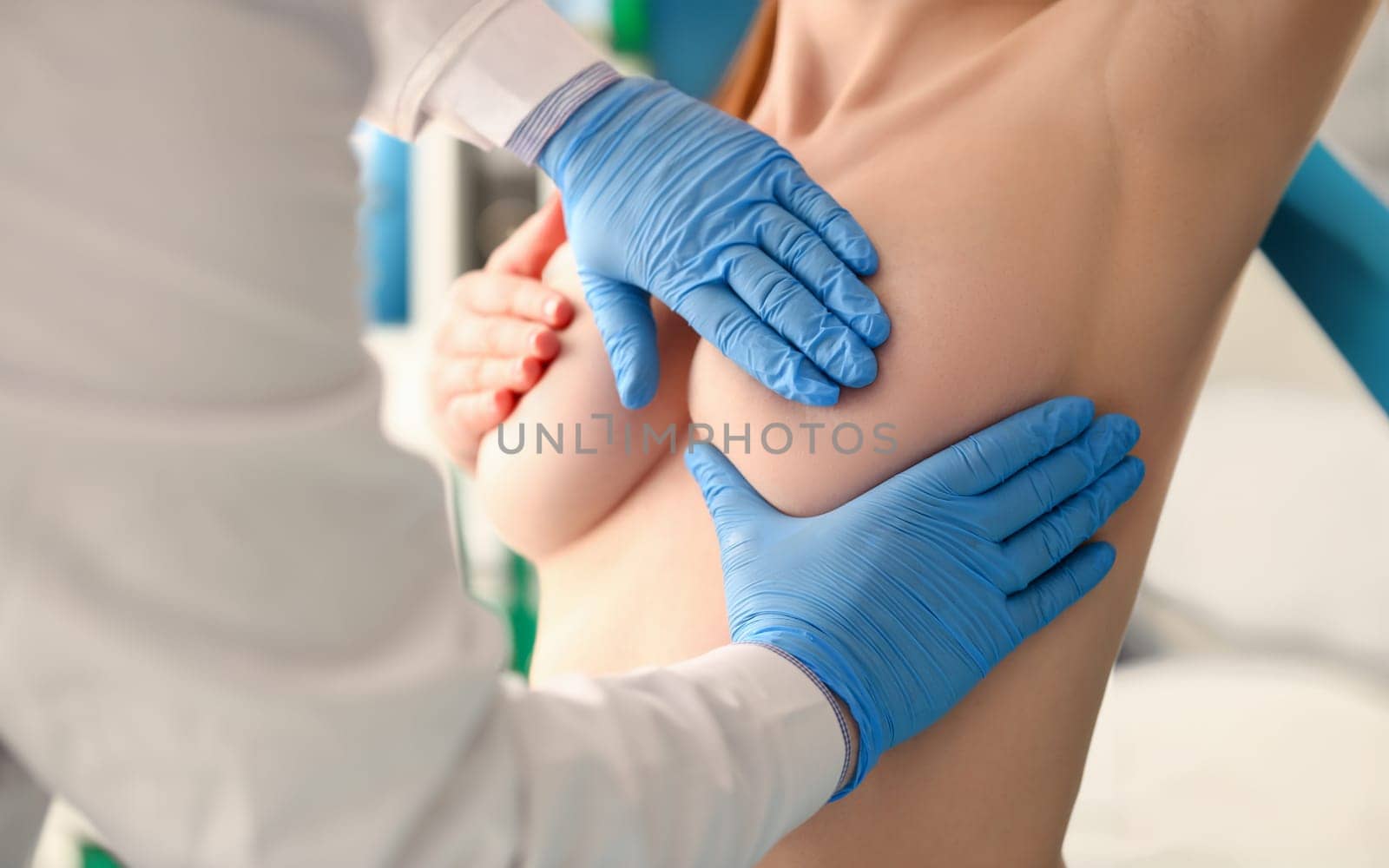 Doctor Mammologist Exam Patient Breast in Hospital. Medic Specialist in Blue Gloves Touch Topless Woman. Mammography and Oncology Consultation in Clinic. Healthcare Awarwness Prevent Cancer Concept