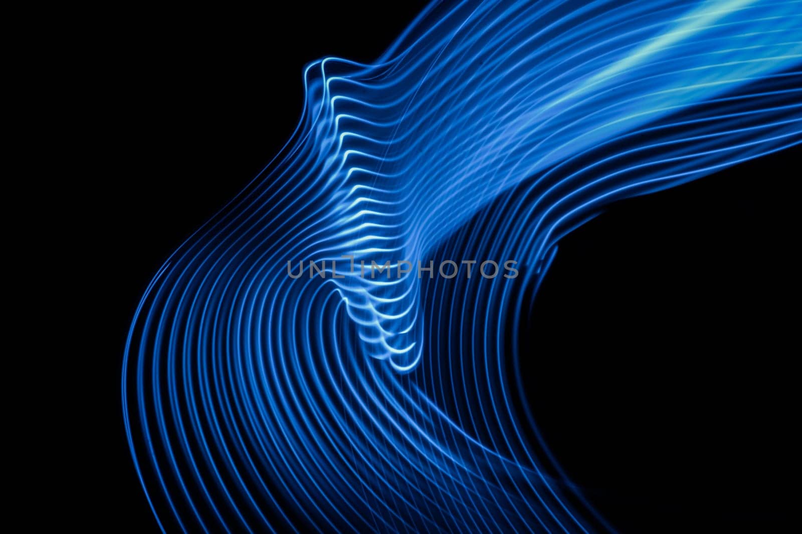 Abstract technology background of long exposure neon light stripes on black. by PaulCarr