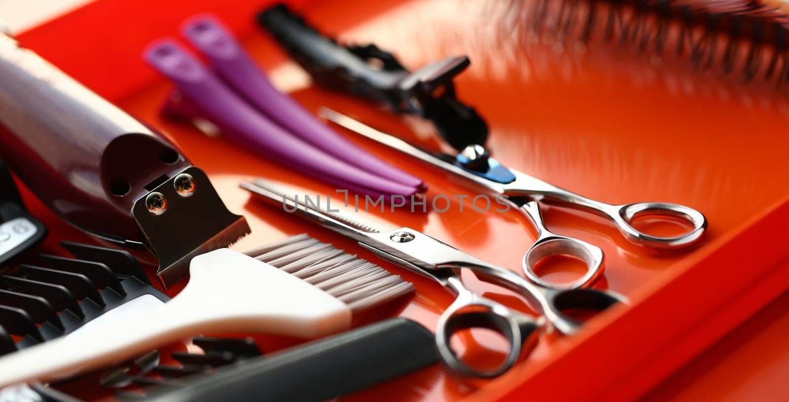 Scissors and Hairdresser Tool on Red Background. Brush, Razor and Hairpin for Hairstylist on Red Background. Accessory for Styling Haircut and Shaving. Instrument Kit Partial View Photography